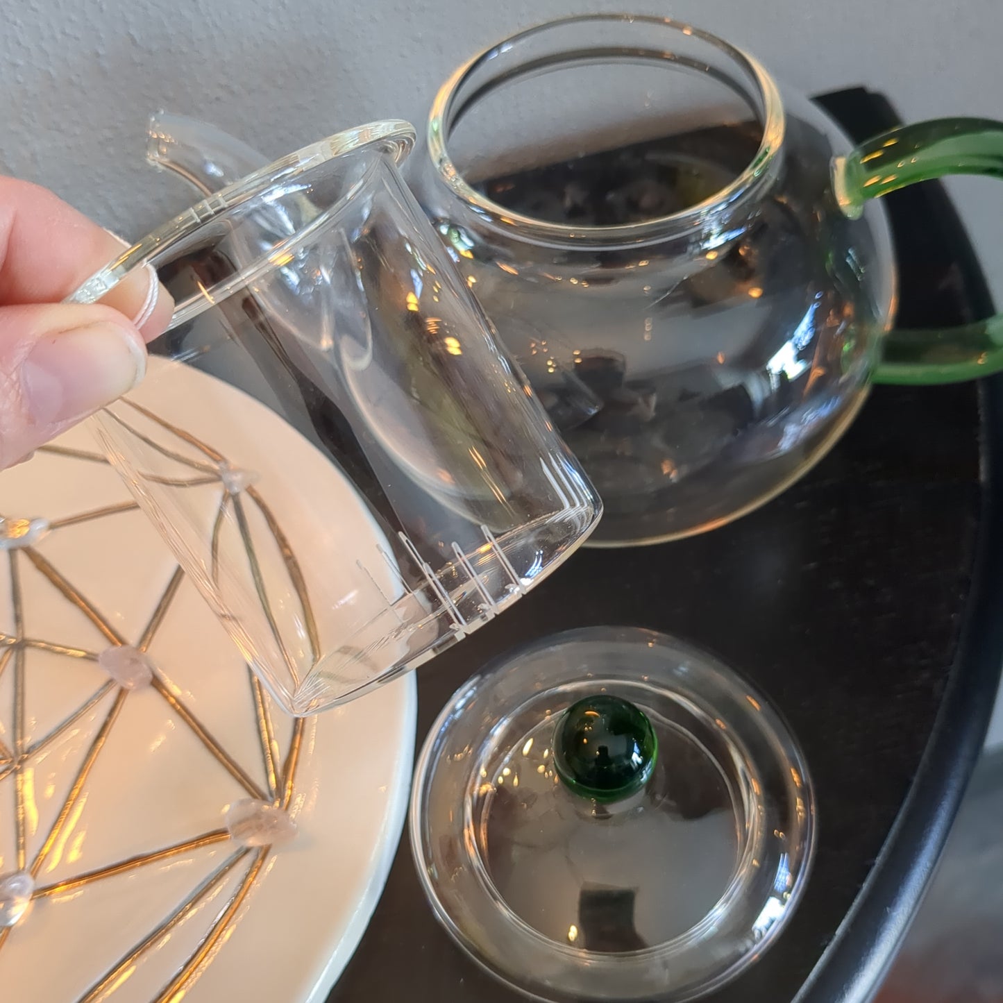 Glass teapot green handle