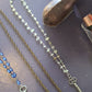 Silver and gemstone skeleton key necklace
