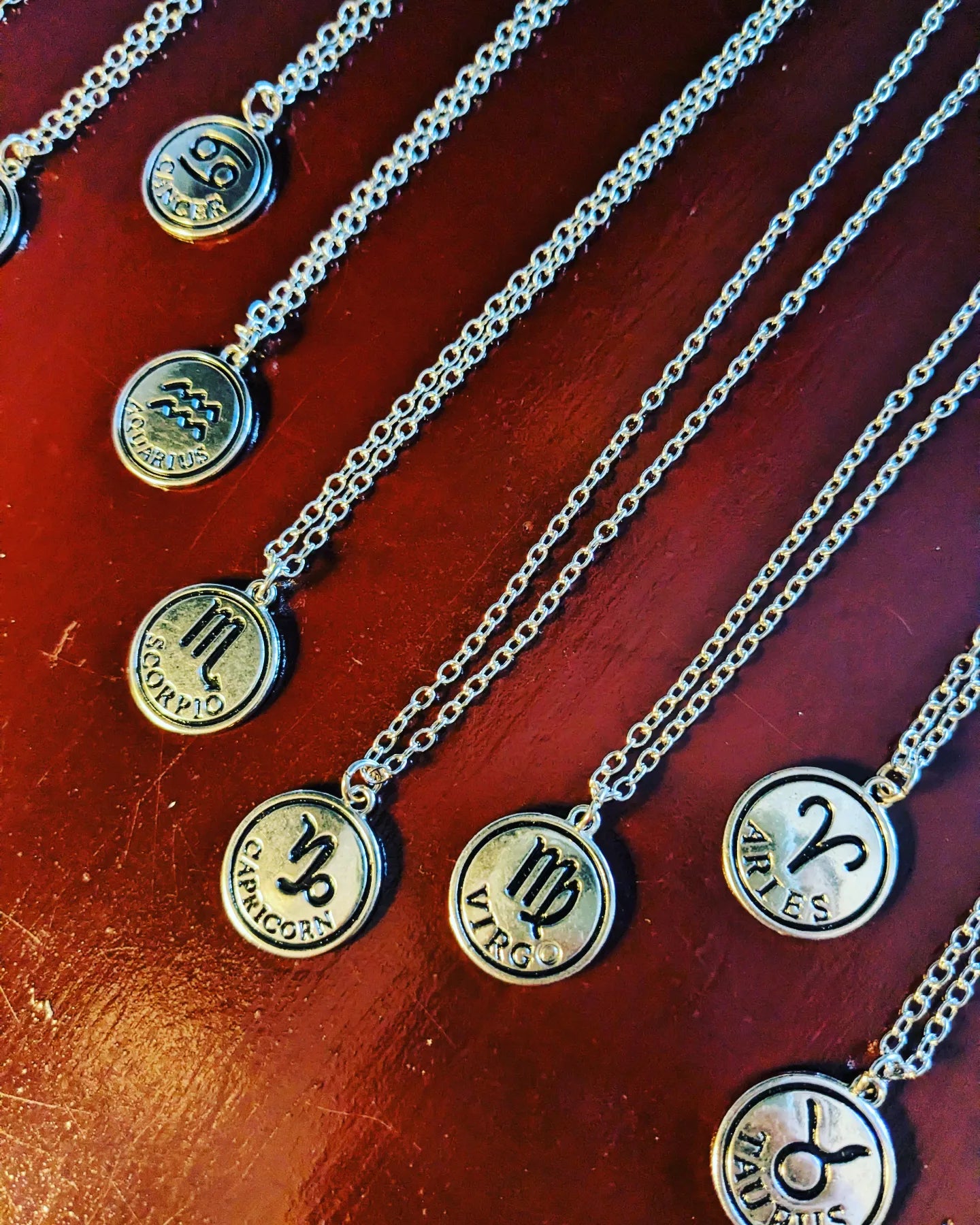 Silver zodiac sign necklaces